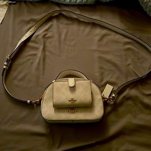 This is a two in one with a white crossbody and a matching wallet